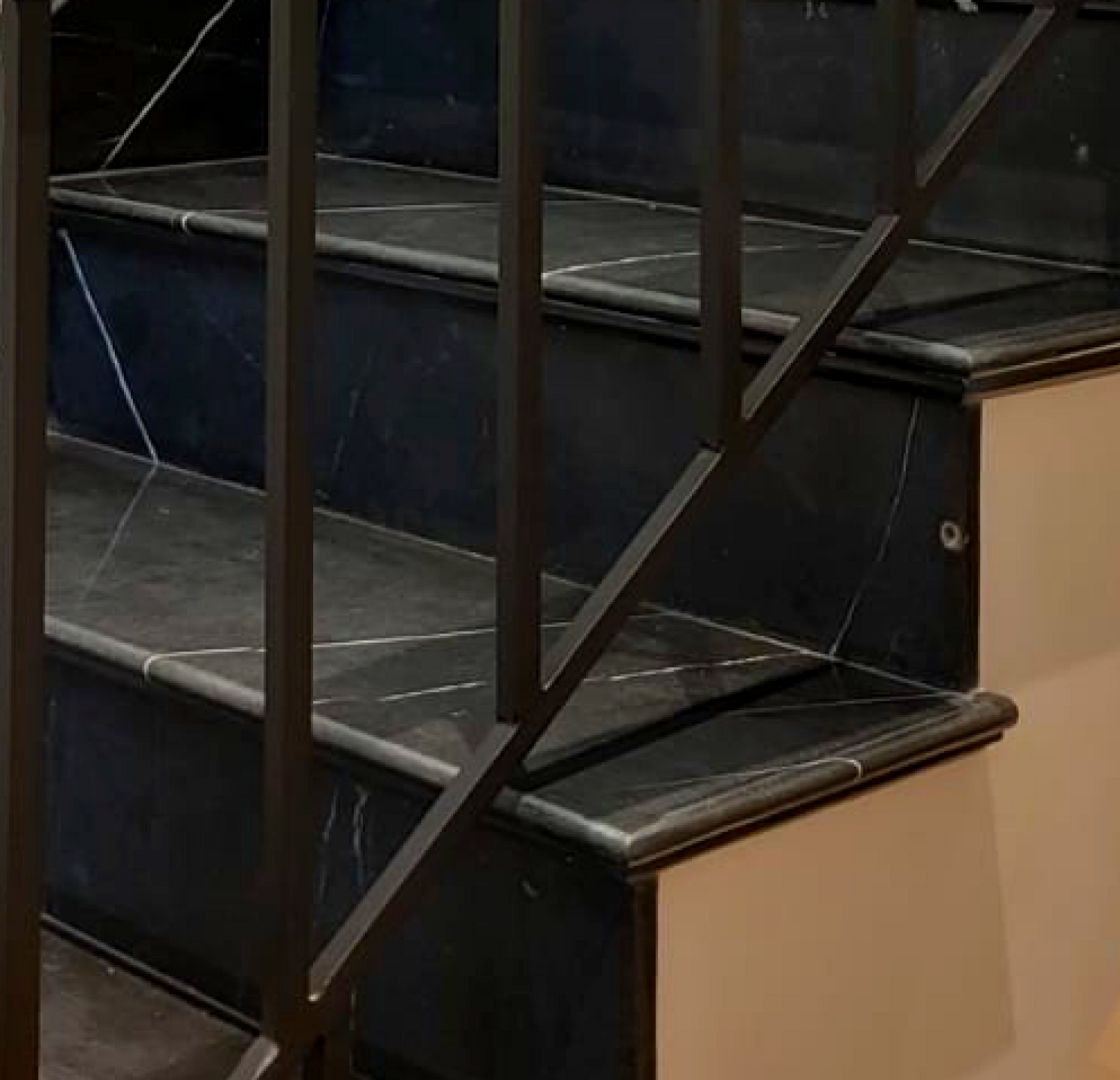 Stone staircase with custom railing